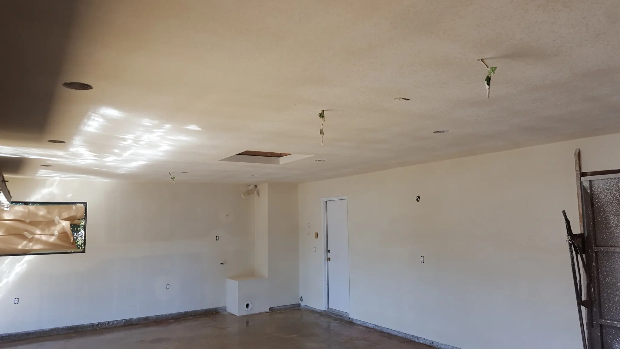 Drywall installation in progress room