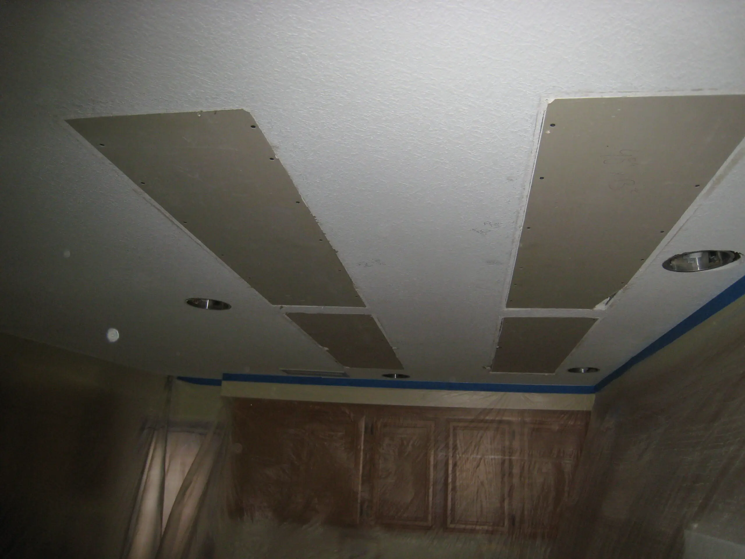Ceiling drywall installation in progress
