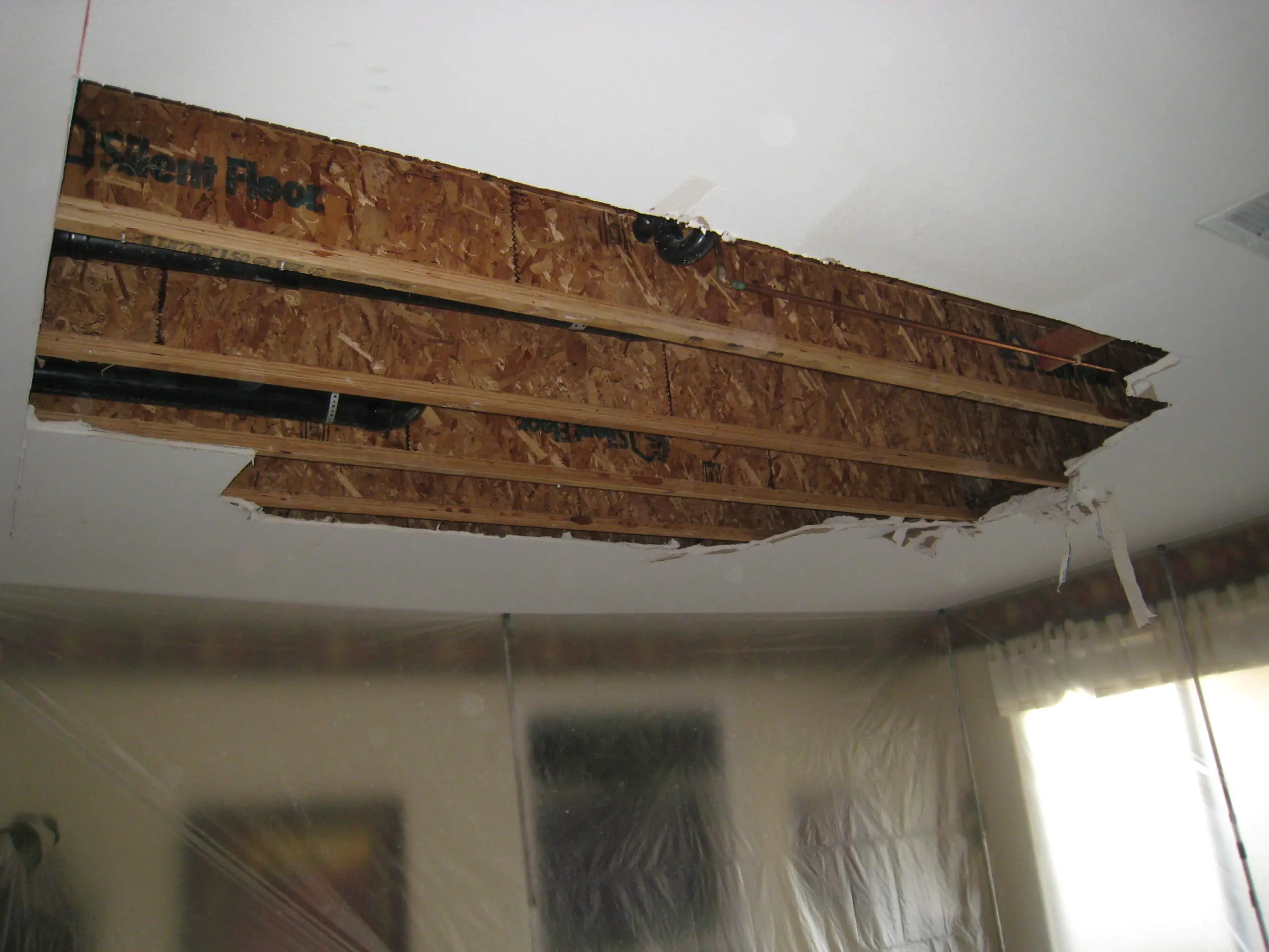 Damaged ceiling needs drywall repair