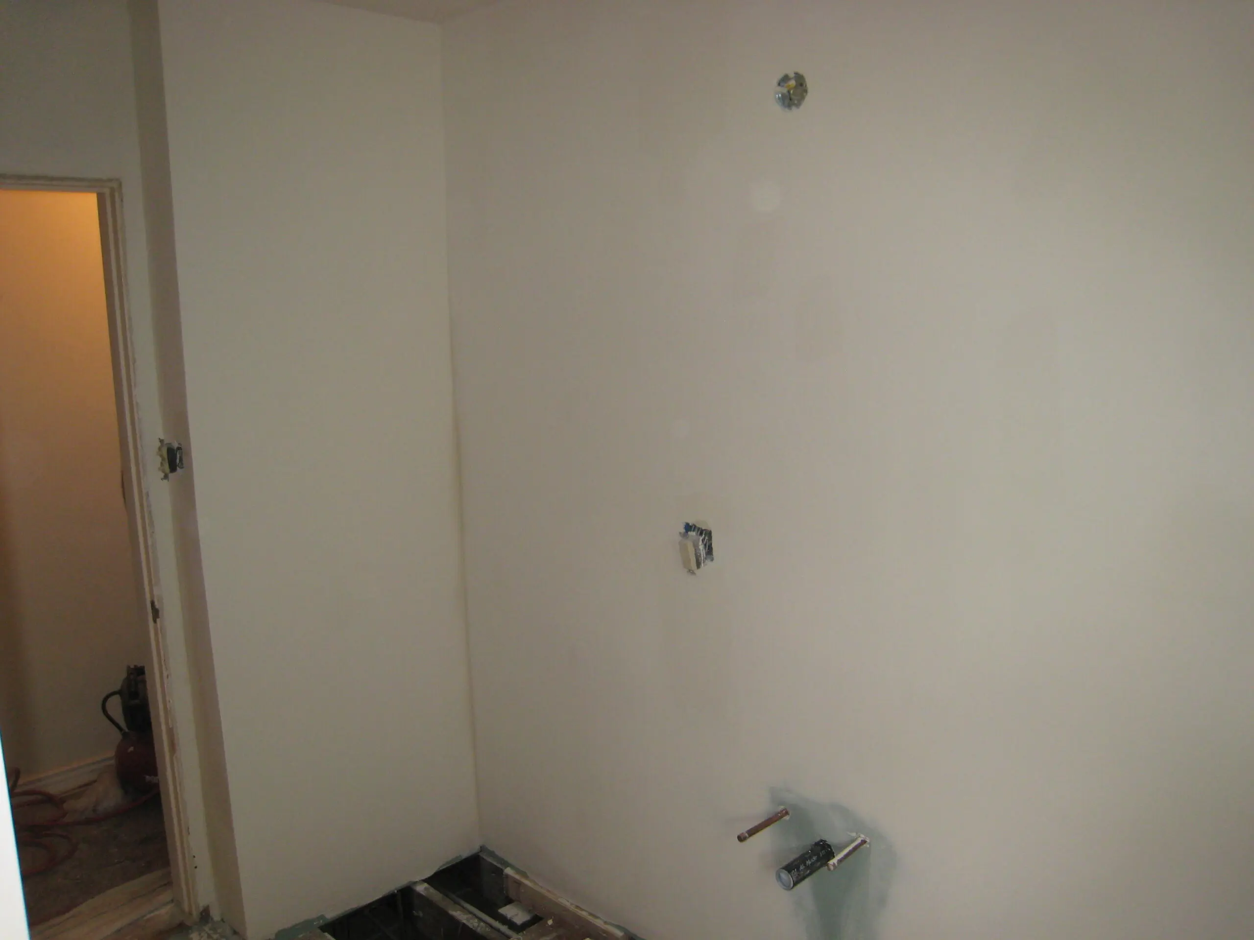 Drywall installation in progress room