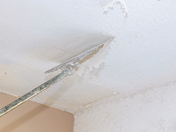 Ceiling drywall repair process underway
