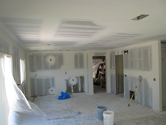 Room drywall installation in progress