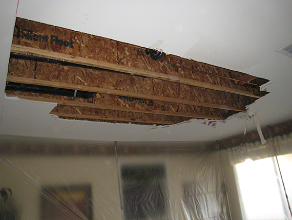 Damaged ceiling needing drywall repair